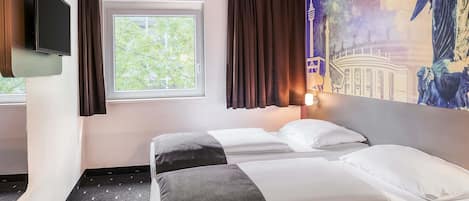 Twin kamer | Een bureau, geluiddichte muren, gratis wifi, beddengoed