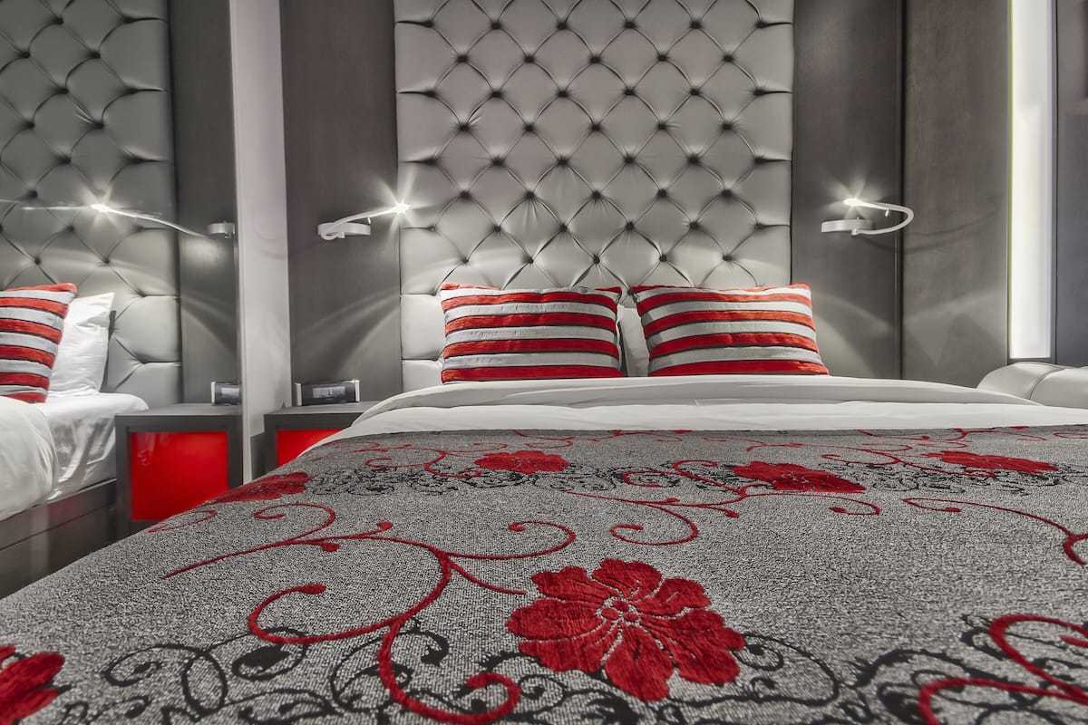 Interior Balcony Signature Room, 1 Queen Bed and 1 Queen Murphy Bed and Fireplace
