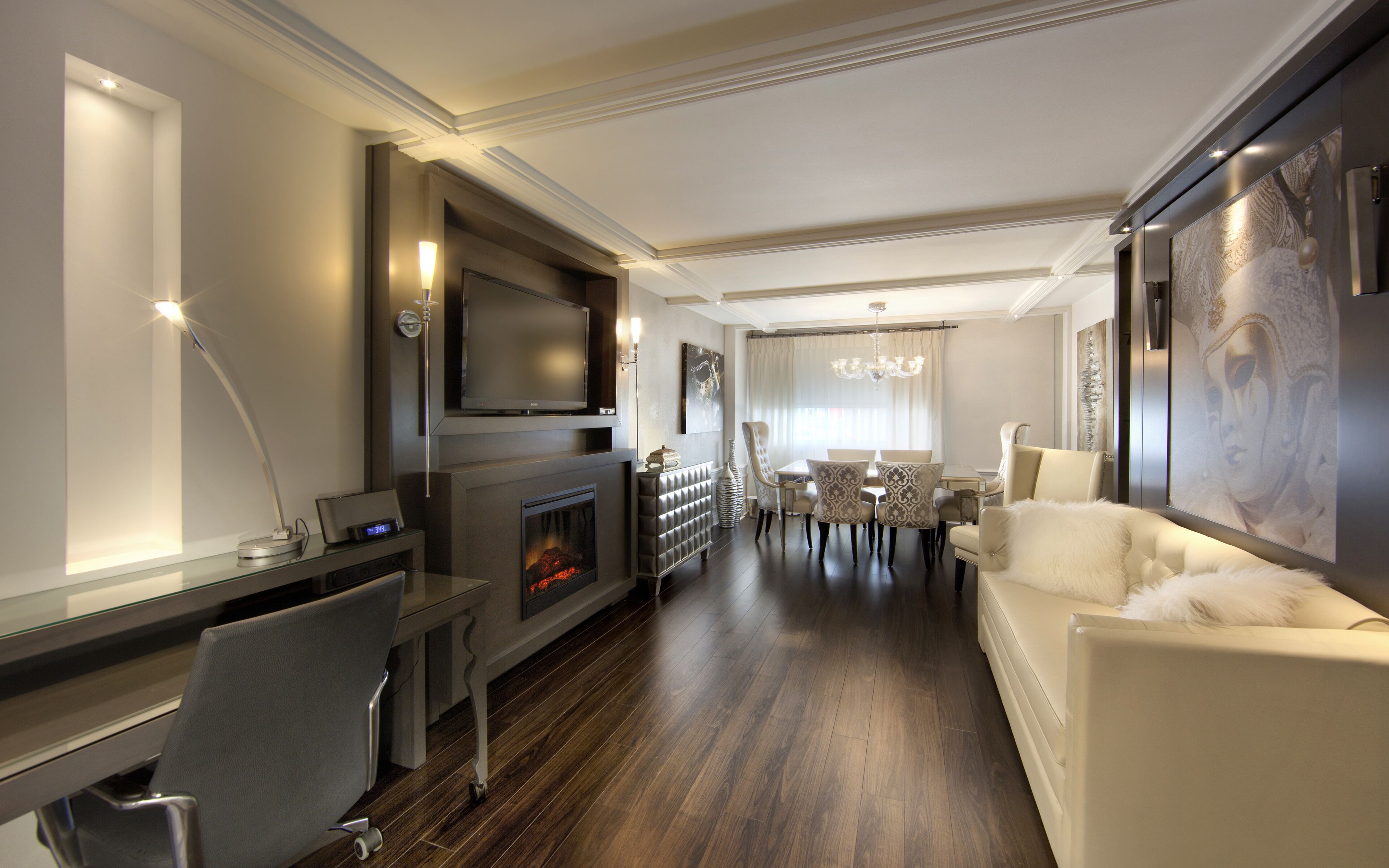 white premium suite, 1 king bed and 1 queen murphy bed | living area | flat-screen tv