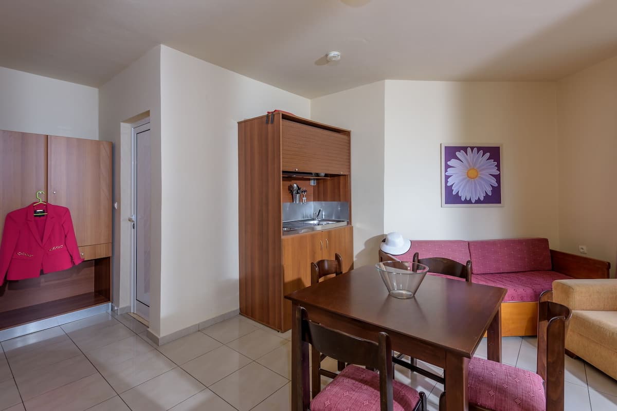 Apartment, 1 Bedroom, Garden View | Living area | TV