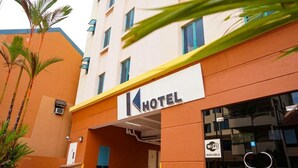 A hotel with a sign indicating Wi-Fi availability.