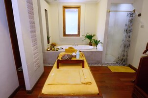 Shower, free toiletries, slippers, towels