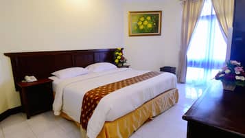Deluxe Room, Beachfront | In-room safe, desk, soundproofing, iron/ironing board
