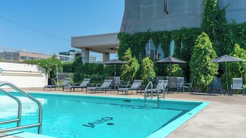 Seasonal outdoor pool, open 10:00 AM to 8:00 PM, sun loungers