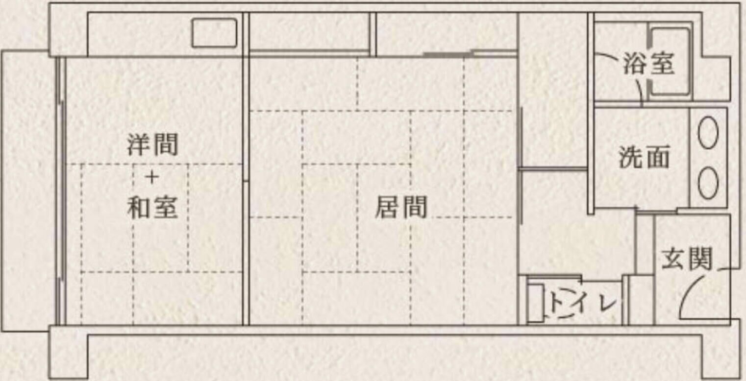 A floor plan with a living area, bedroom, bathroom, and kitchen.