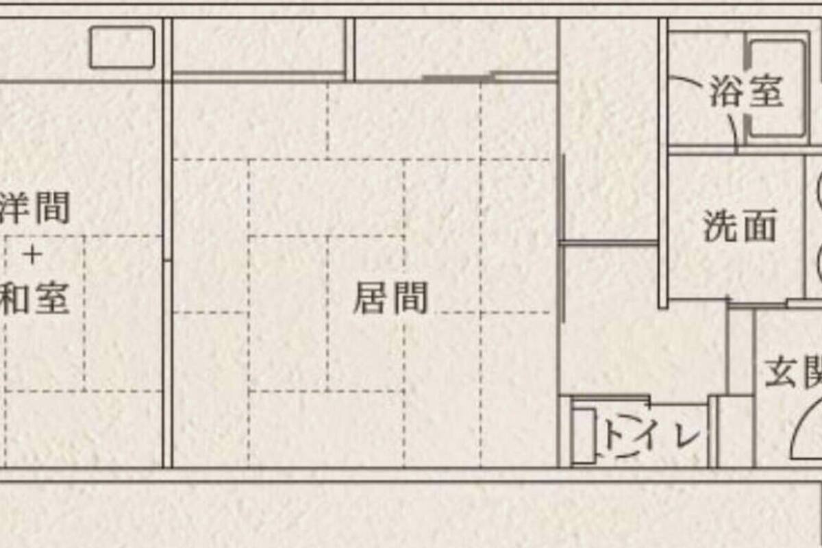 A floor plan with a living area, bedroom, bathroom, and kitchen.