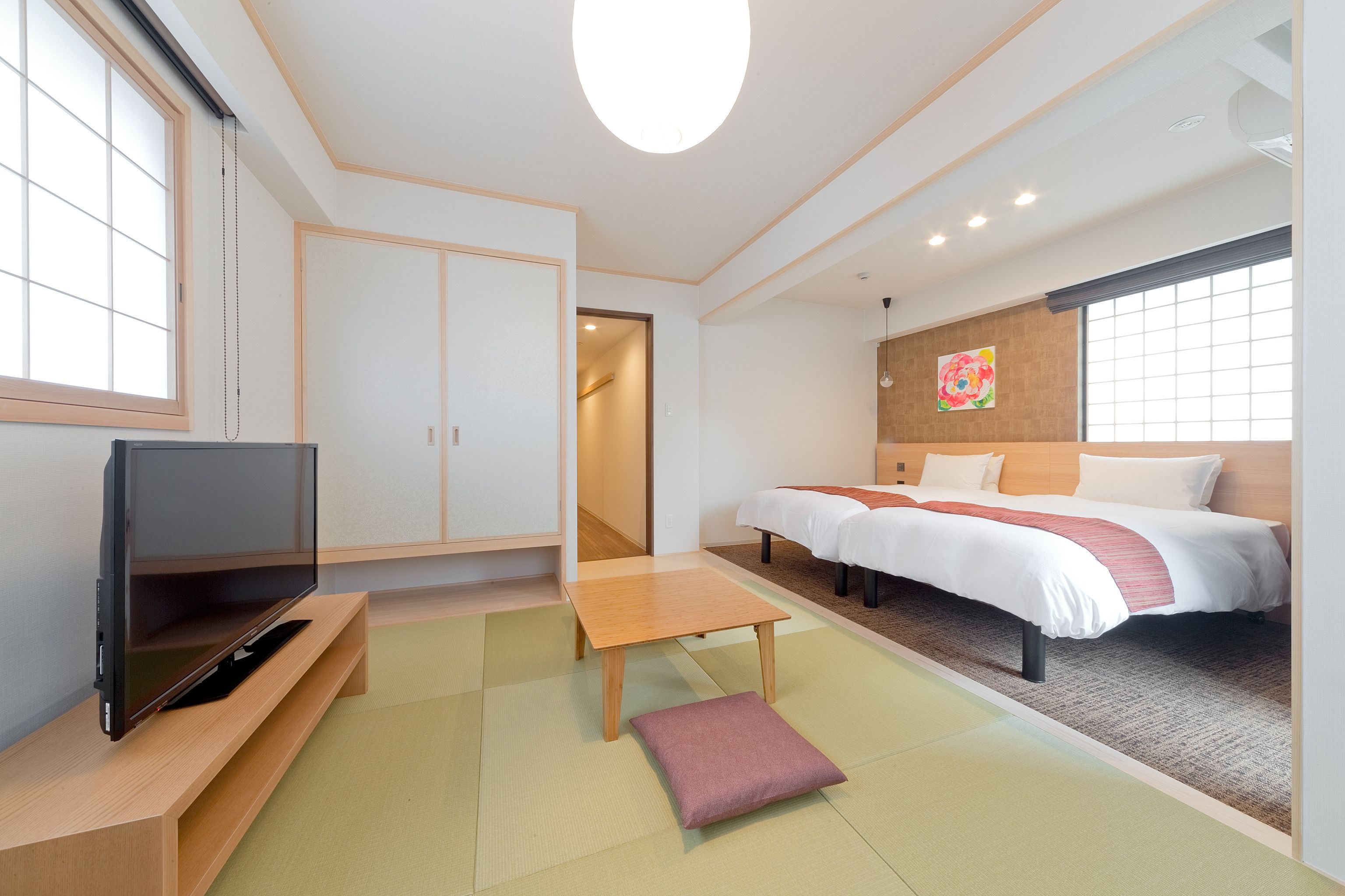 deluxe twin room with tatami area | in-room safe, blackout curtains, soundproofing, free wifi