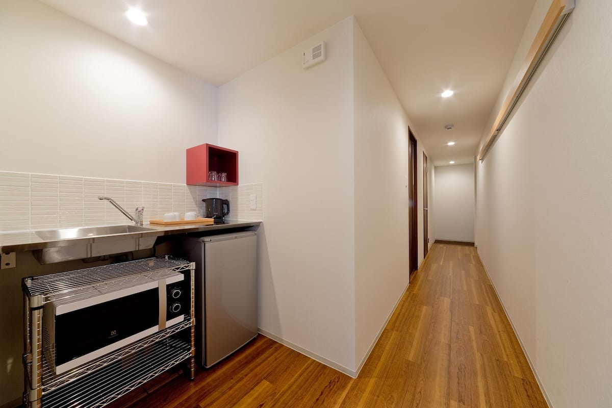deluxe twin room with tatami area | private kitchen | fridge, microwave