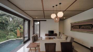 A modern living room with a large window, a pool, and a television.