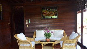 Garden Views 2 Bedrooms Villa | Living area | 32-inch LCD TV with cable channels, TV, DVD player - Green Coconut Village C3 (Koh Samui)