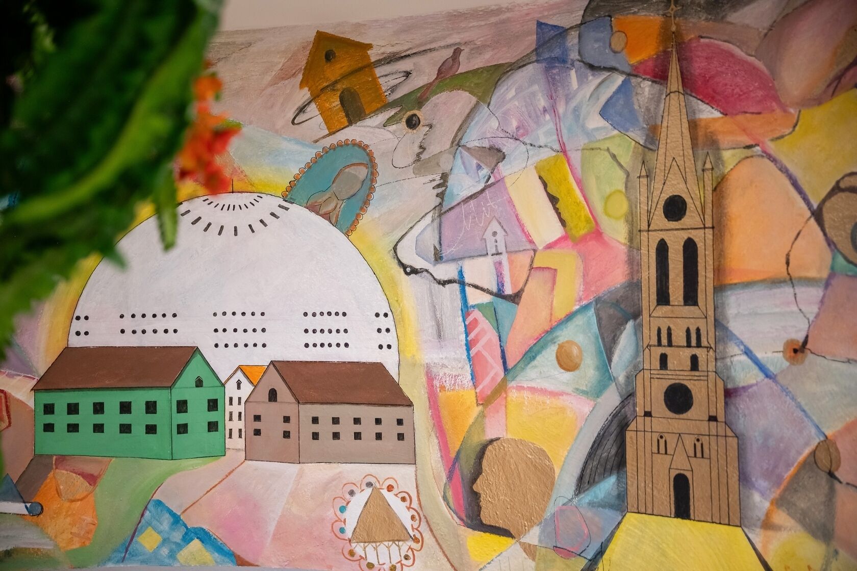 A colorful abstract painting with geometric shapes and buildings.