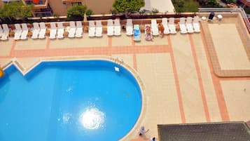 Indoor pool, outdoor pool, pool umbrellas, sun loungers