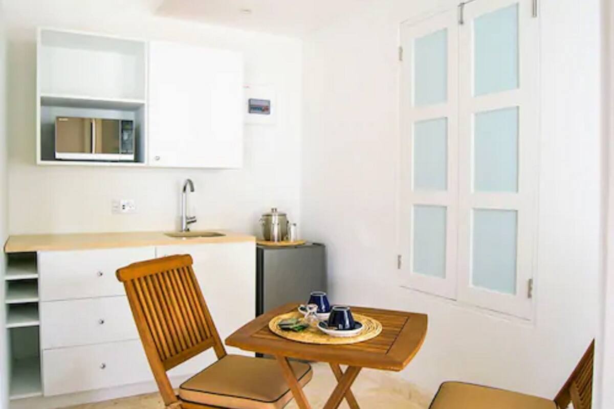 family villa, 2 bedrooms, kitchenette, garden area | private kitchen | fridge, microwave, coffee/tea maker, electric kettle