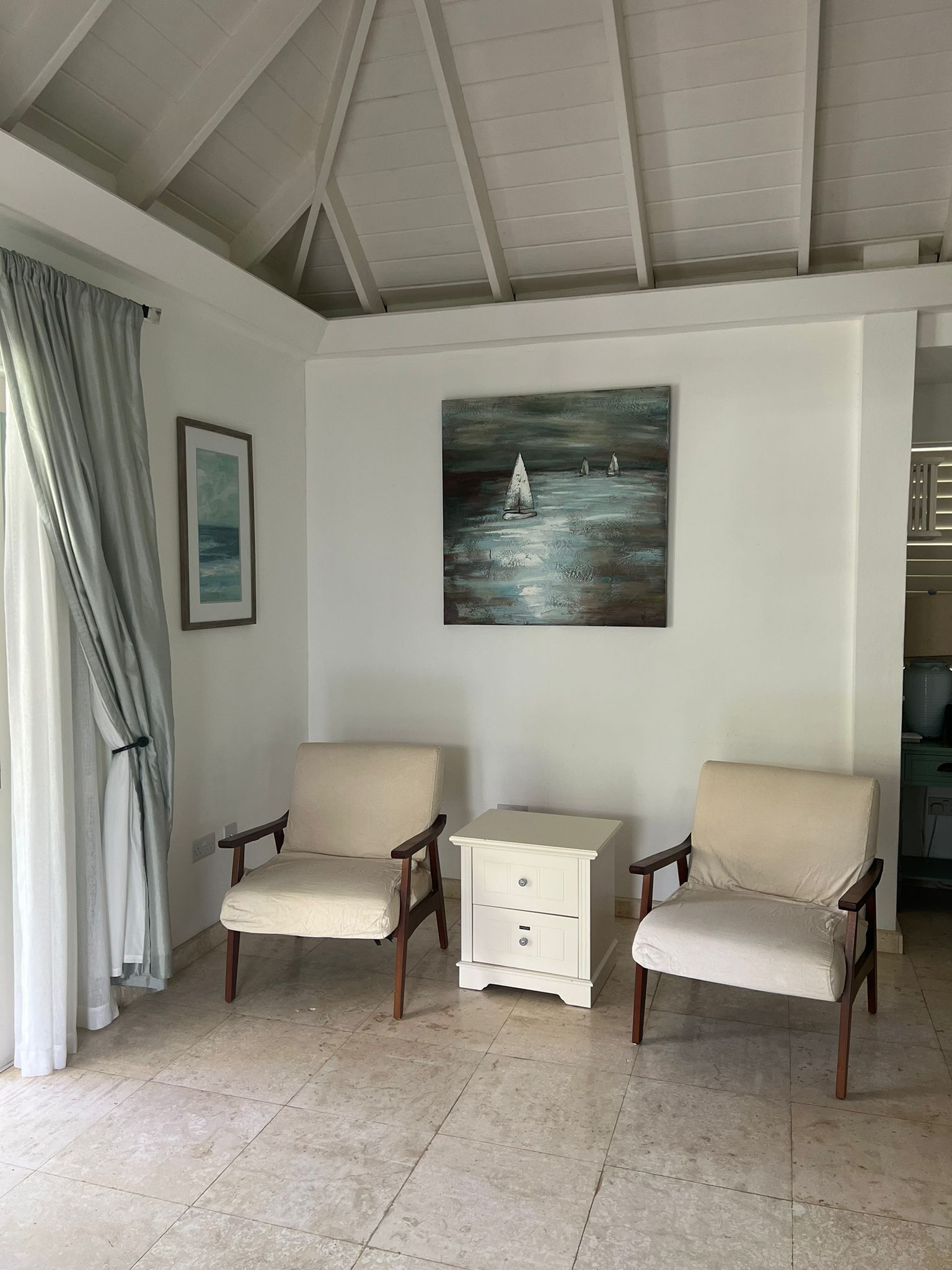 villa, 1 king bed, beachfront | in-room safe, desk, laptop workspace, iron/ironing board