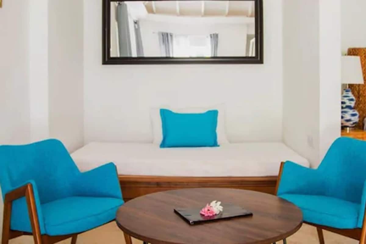 family villa, 2 bedrooms, 2 bathrooms, kitchenette, garden area | in-room safe, desk, laptop workspace, iron/ironing board