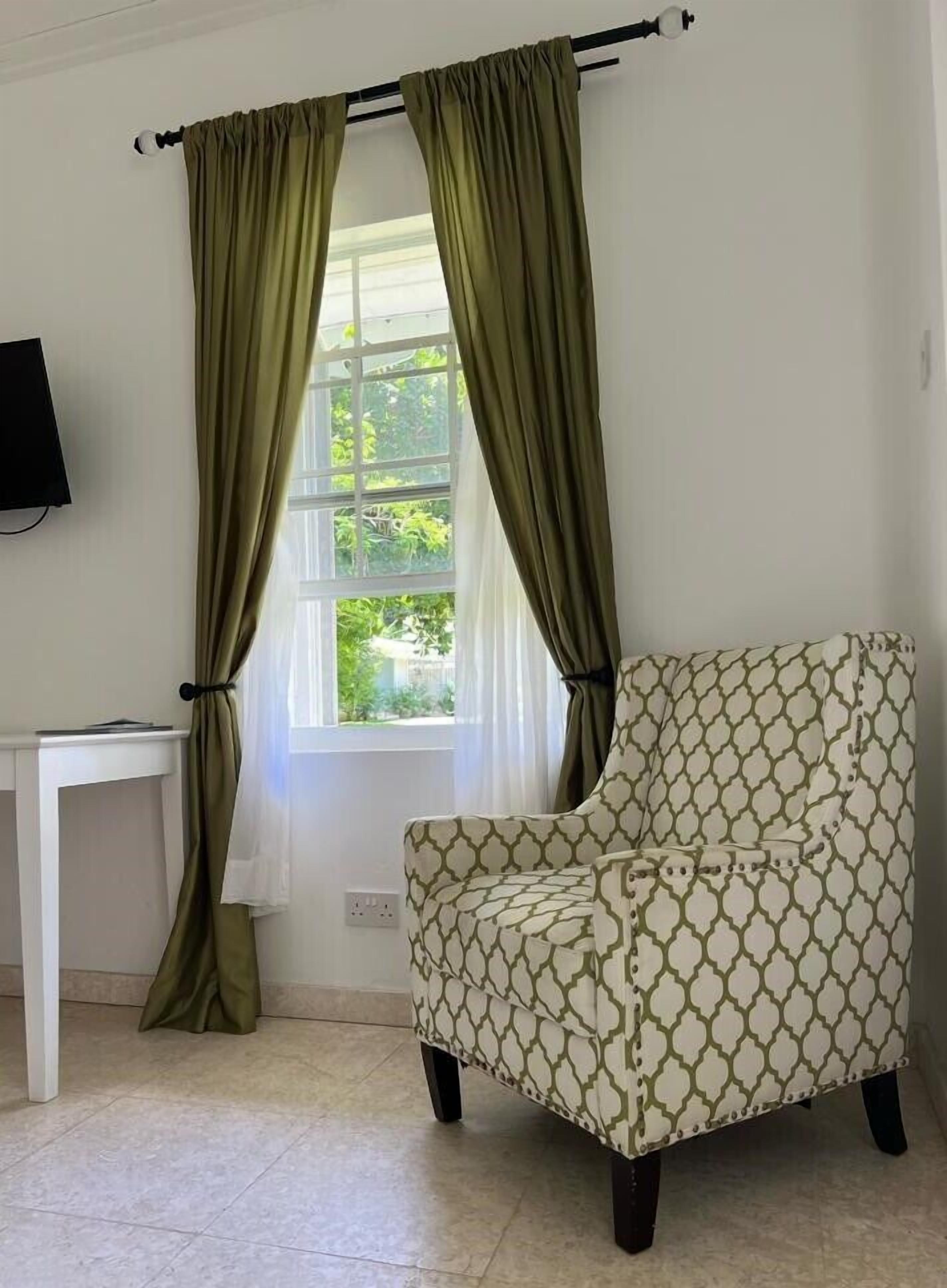 beach suite, king bed, beach view | living area | 32-inch flat-screen tv with cable channels, tv