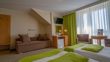 Desk, blackout curtains, free cots/infant beds, free WiFi