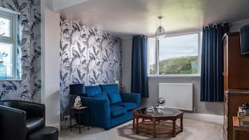 Habitación doble superior, baño privado | Salón