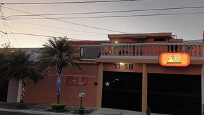 A building with a sign reading "NOVO HOSTEL" and the number "17-5B" above the entrance. - Novohostal B&B (Guatemala City)