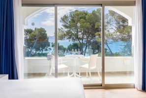 Apartment, 1 Bedroom, Sea View (Apartment) | Minibar, desk, blackout drapes, iron/ironing board