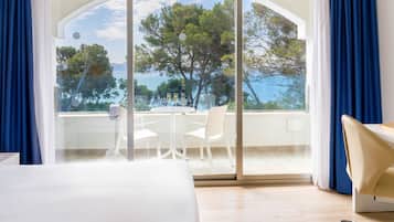 Minibar, desk, blackout drapes, iron/ironing board