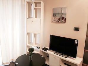 1 quarto, ferros/tábuas de passar roupa