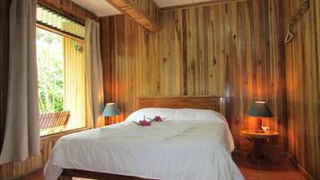 Standard Room, Garden View | 2 bedrooms, in-room safe, desk, free cribs/infant beds