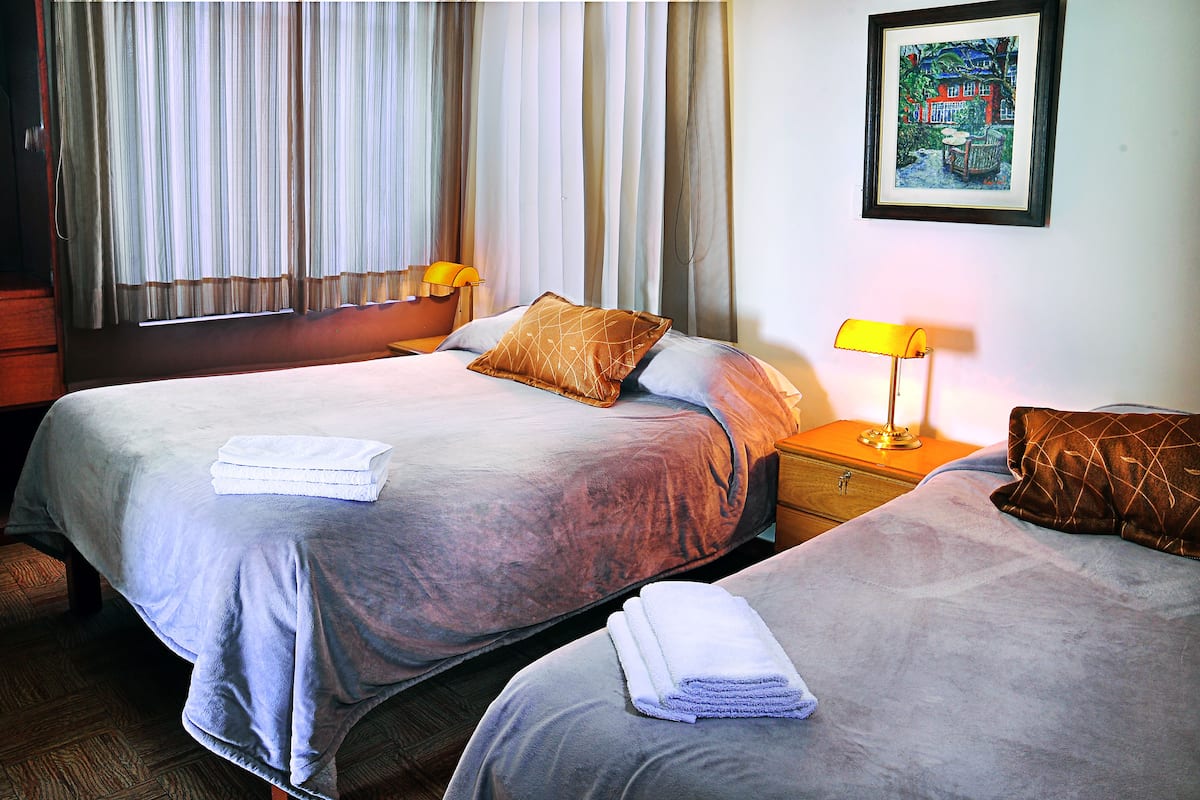 Laptop workspace, blackout drapes, free WiFi, bed sheets