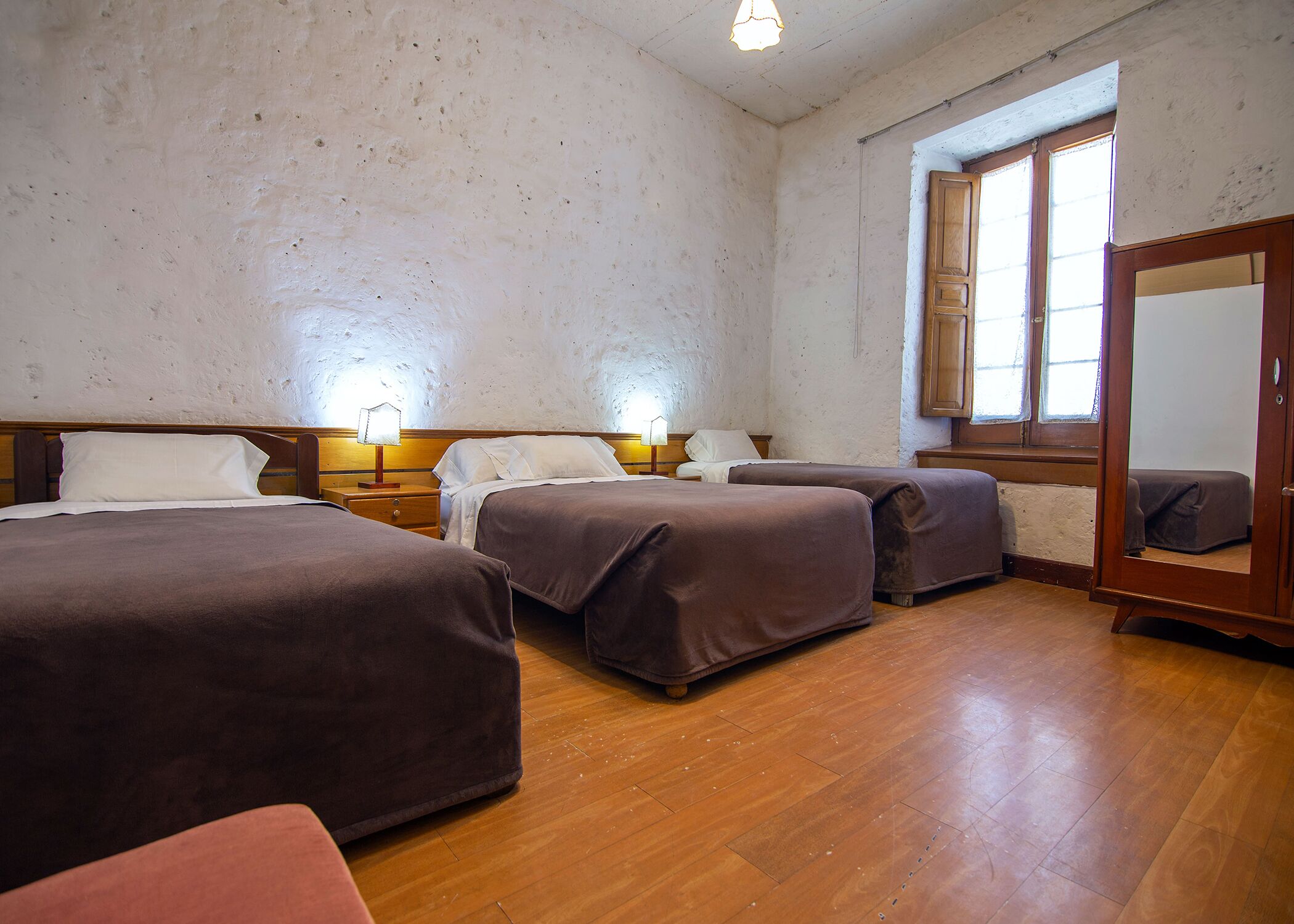 Family Room, Multiple Beds | Laptop workspace, blackout drapes, free WiFi, bed sheets