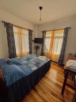 Standard Quadruple Room, 2 Double Beds | Individually decorated, desk, laptop workspace, soundproofing