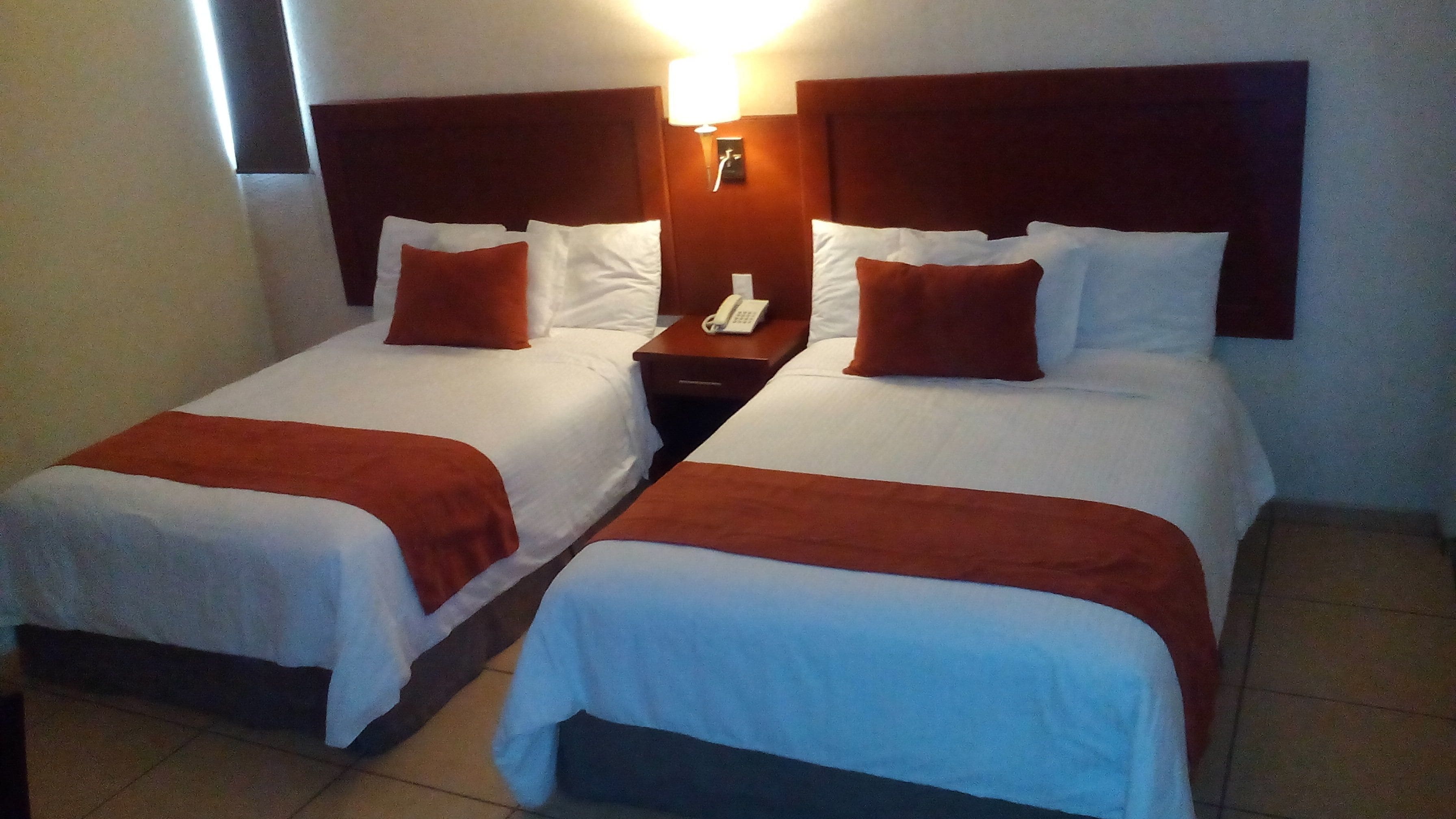 junior quadruple room | premium bedding, blackout curtains, free wifi, bed sheets