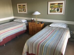Desk, iron/ironing board, bed sheets - Laura's Lodge (Saskatoon)