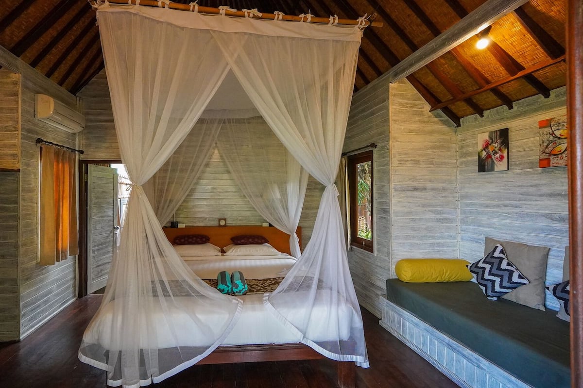 Doppia Deluxe, 1 letto queen, vista giardino | 2 camere, biancheria da letto di alta qualità, minibar