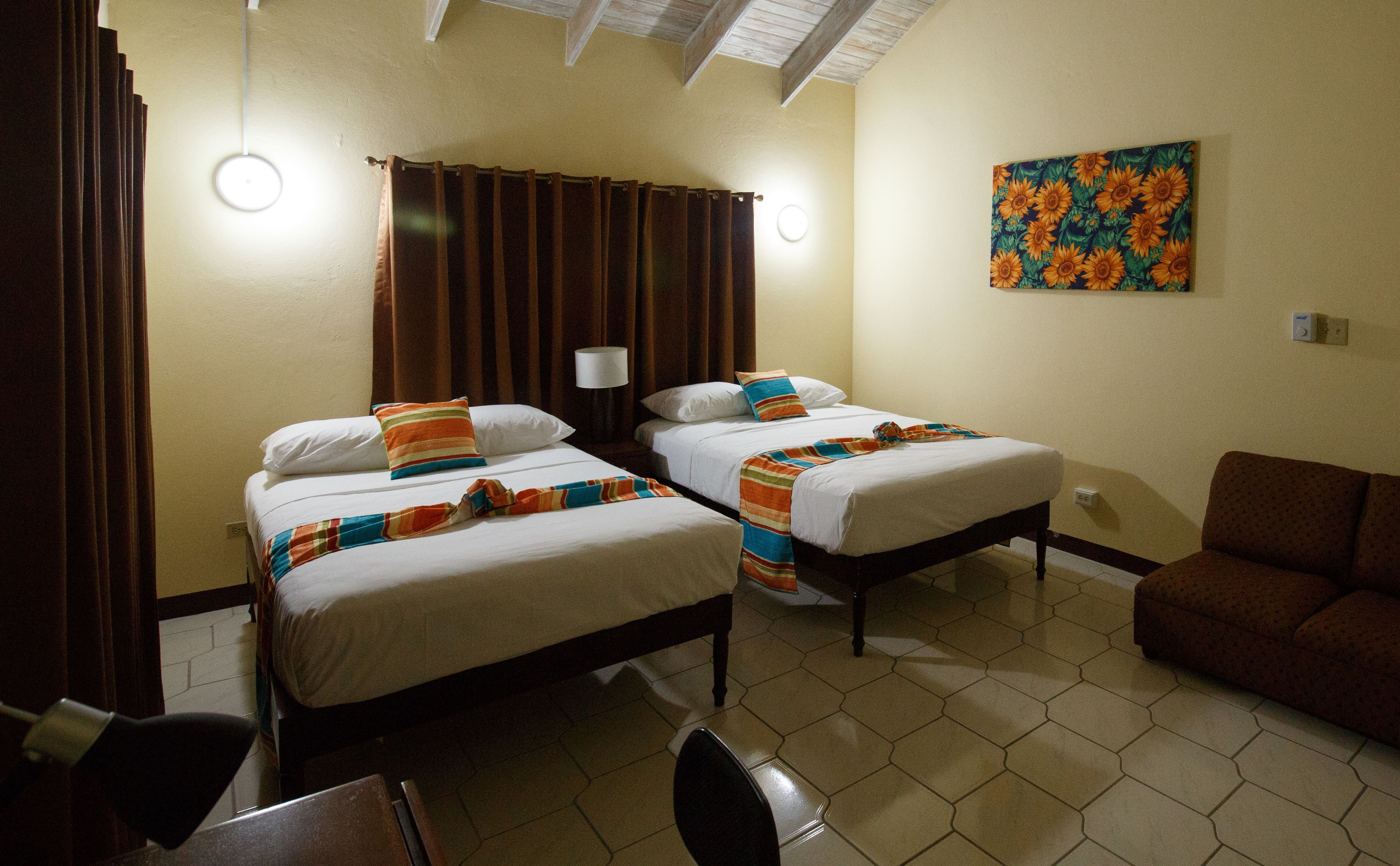 deluxe room, 2 double beds | in-room safe, iron/ironing board, free wifi, bed sheets