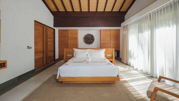 A modern bedroom with a wooden bed, a large window with sheer curtains, and a wooden ceiling.