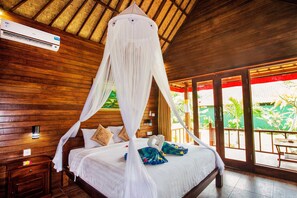 Cottage Deluxe, 1 phòng ngủ, khu vực vườn | Bàn, phòng cách âm, truy cập Internet không dây miễn phí 