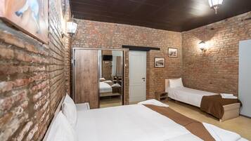 Family Room | Hypo-allergenic bedding, minibar, in-room safe, desk