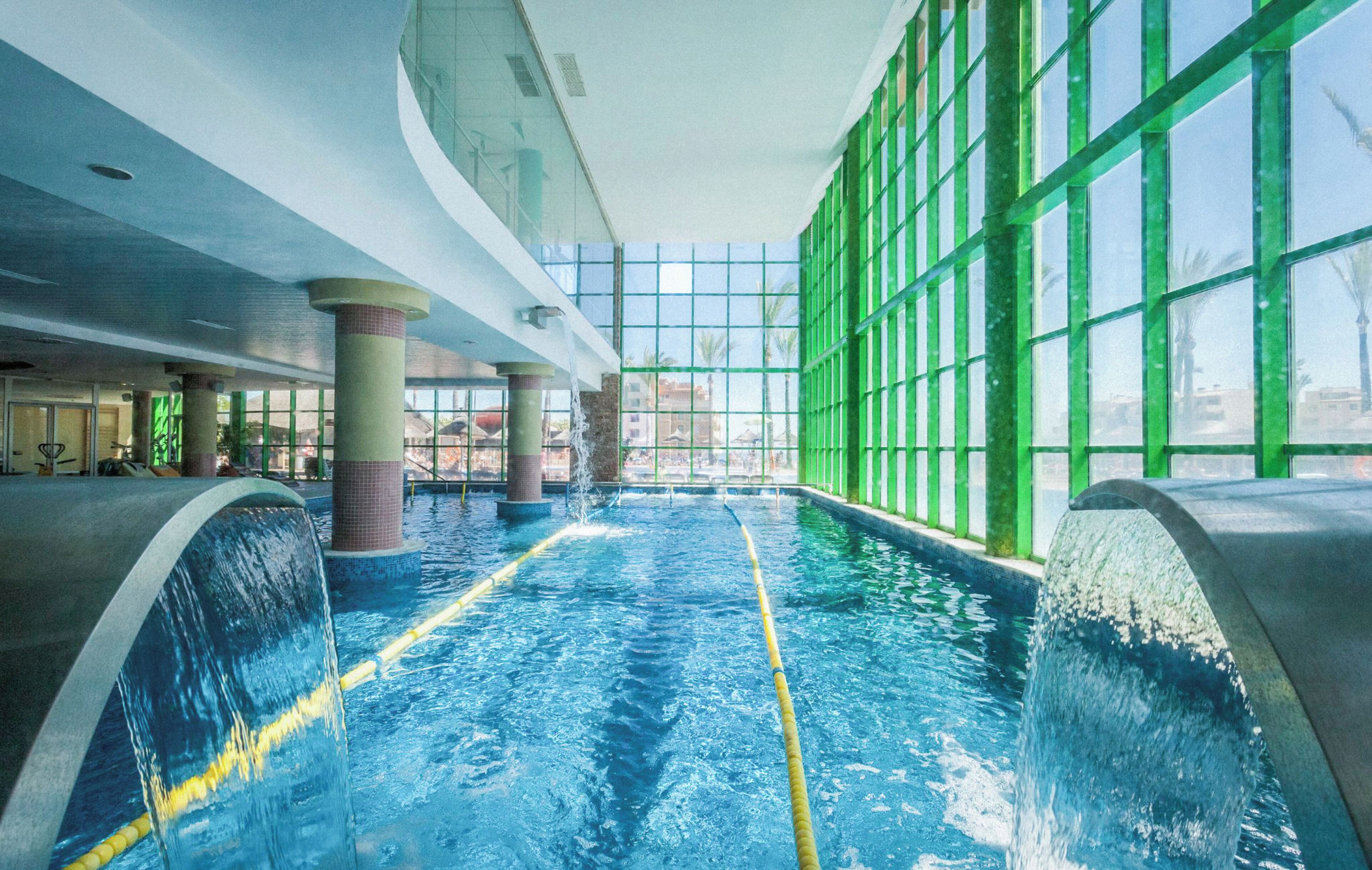 Outdoor pool, pool umbrellas, sun loungers