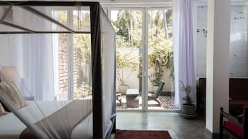 Kahden hengen deluxe-huone, näköala puutarhaan | Tallelokero huoneessa, äänieristys, lisävuoteet, ilmainen Wi-Fi