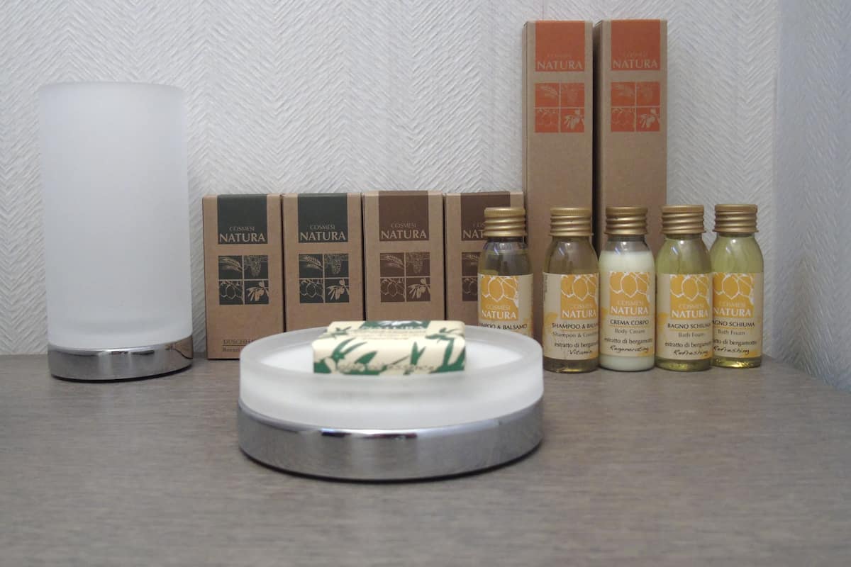 Shower, rainfall showerhead, designer toiletries, hair dryer