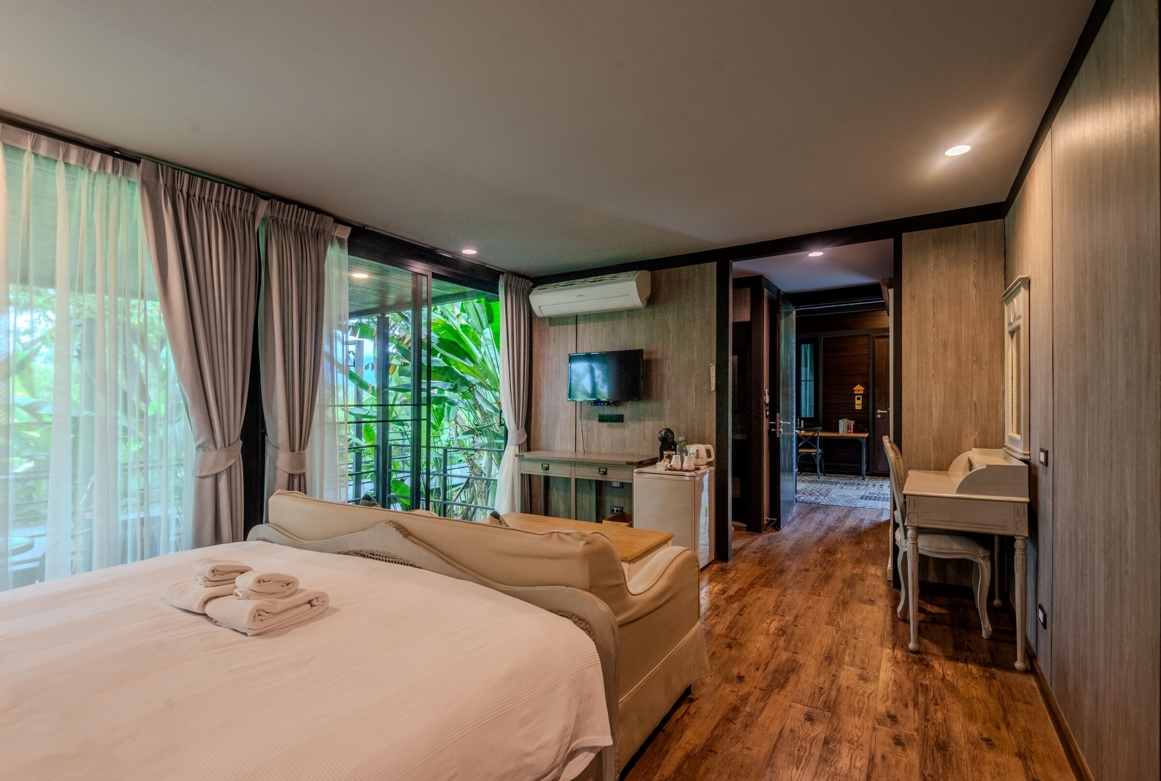 exclusive villa, 4 bedrooms, garden view, garden area | 1 bedroom, minibar, in-room safe, blackout curtains