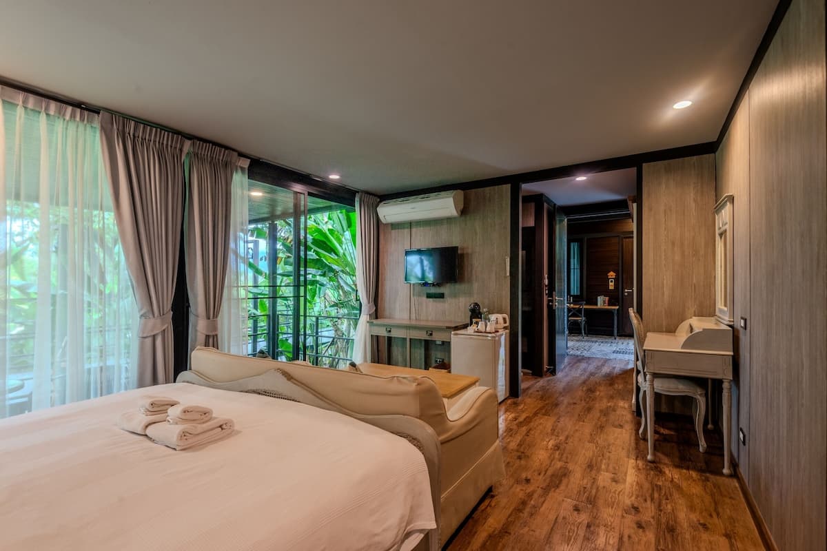 exclusive villa, 4 bedrooms, garden view, garden area | 1 bedroom, minibar, in-room safe, blackout curtains