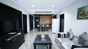 Suite Deluxe, 2 habitaciones | Zona de estar
