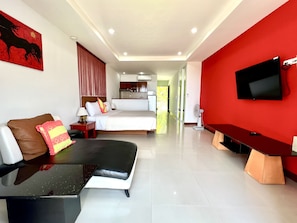 Superior Deluxe double room with Seaview  | Coin séjour | Télévision à écran plat, lecteur de DVD