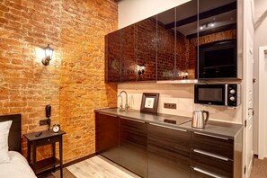 Family Studio, 1 Queen Bed with Sofa bed, Kitchenette, Courtyard View