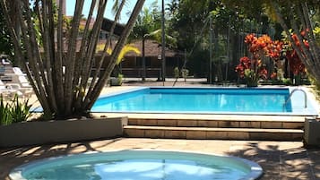 Outdoor pool, pool umbrellas, sun loungers
