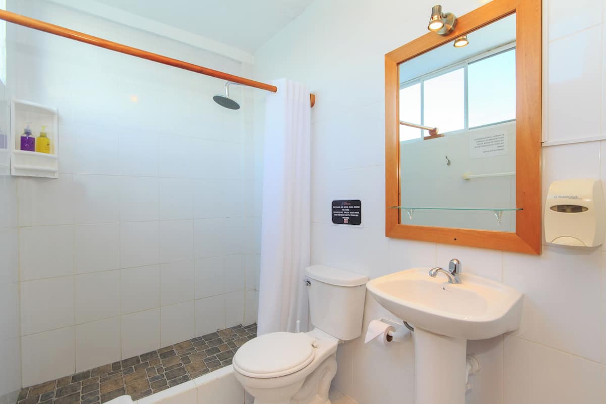 quadruple room, sea view | bathroom | shower, hair dryer, towels, soap