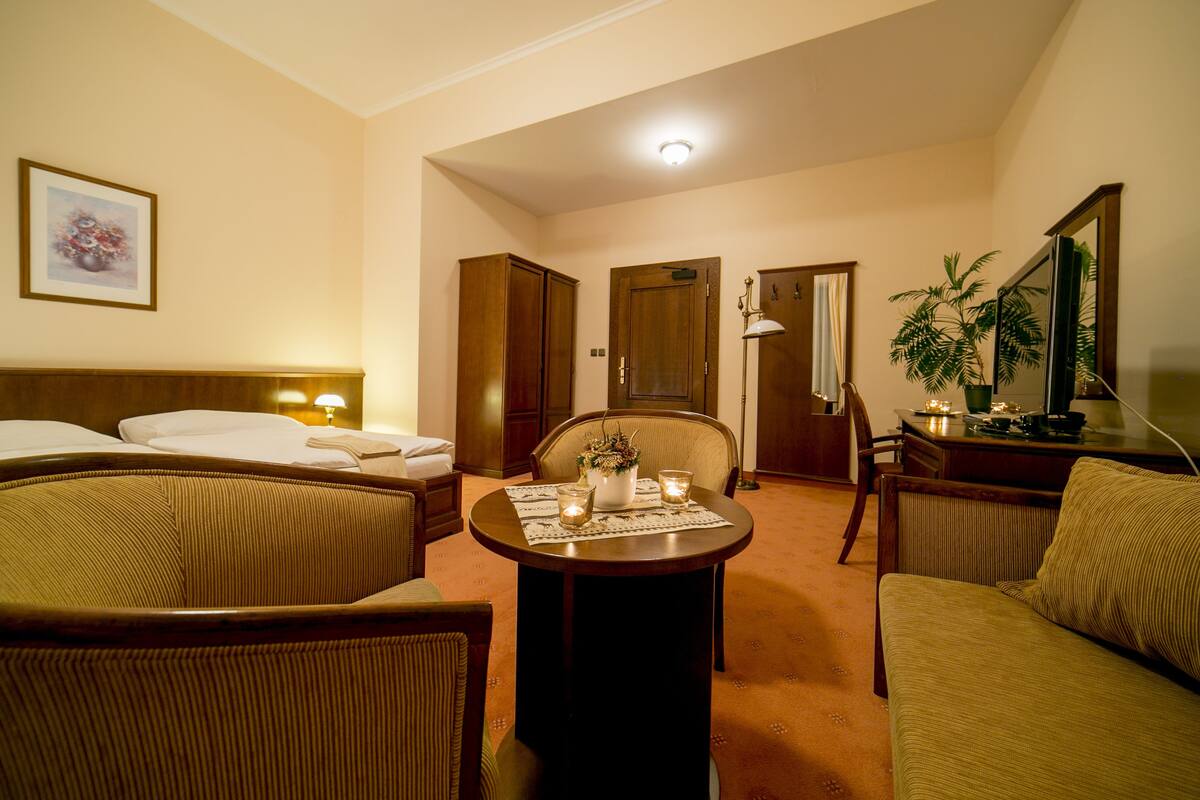 Minibar, desk, blackout curtains, iron/ironing board