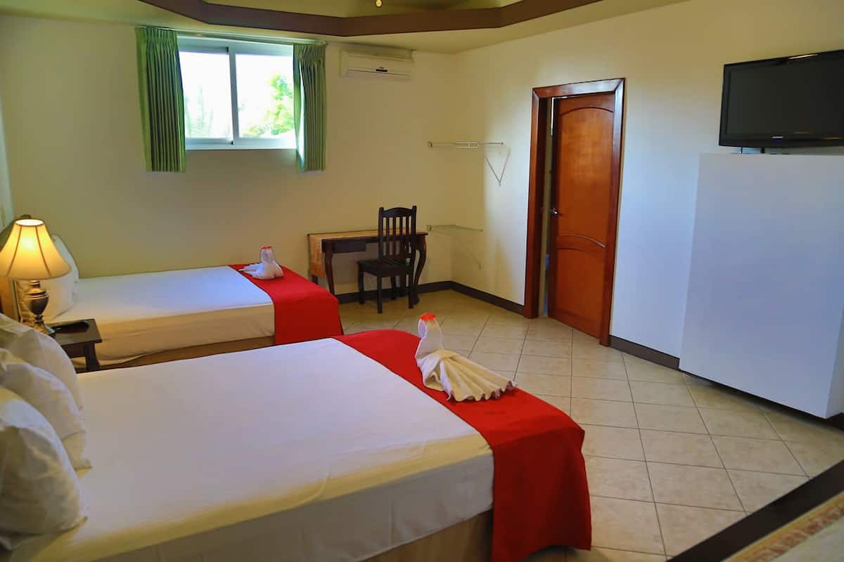 Standard Room, 2 Queen Beds | In-room safe, desk, rollaway beds, free WiFi
