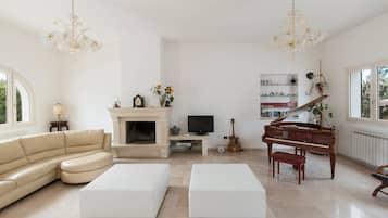 Villa, 4 Bedrooms | Living room | TV, fireplace, DVD player